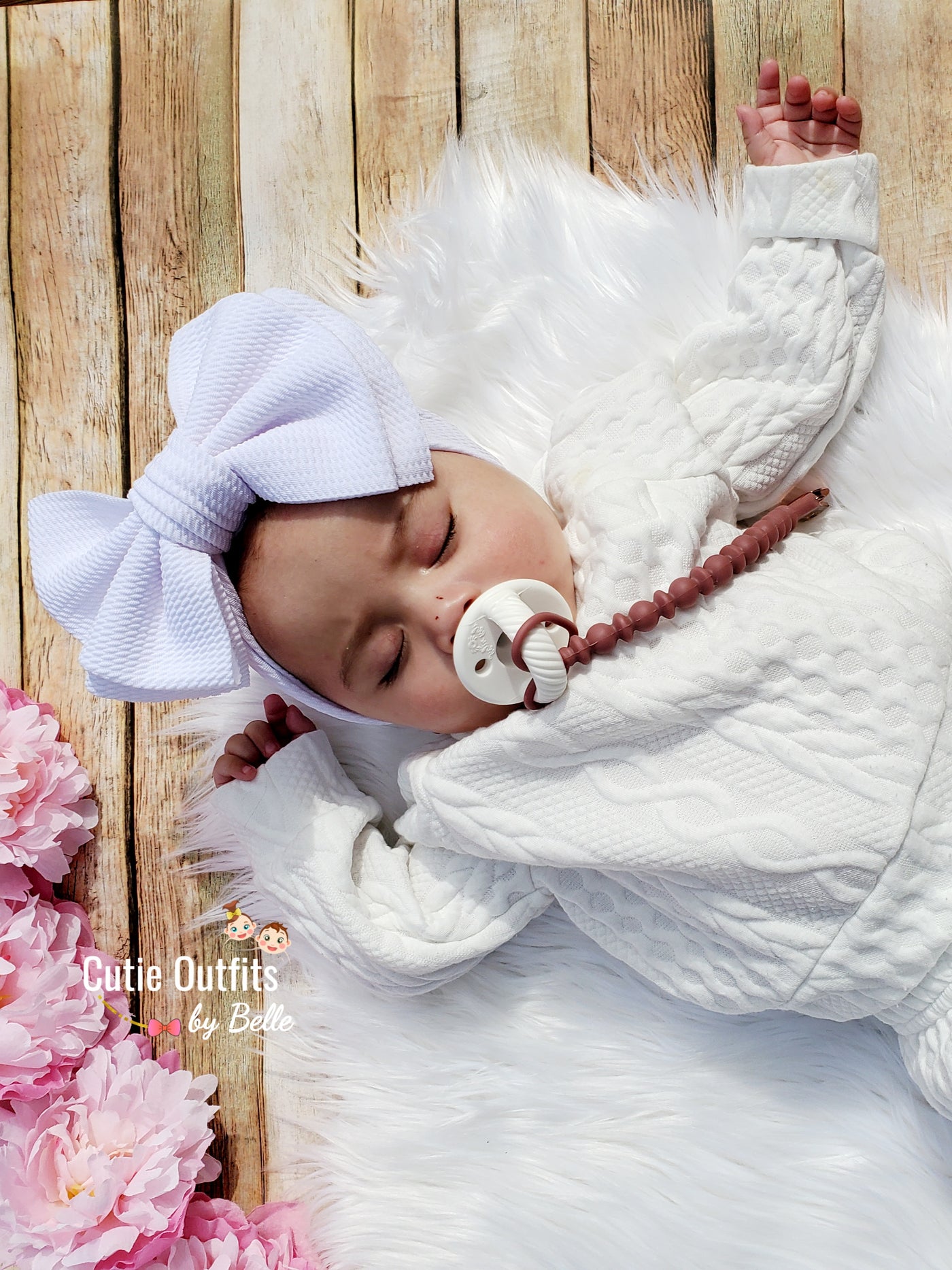 White knotted baby bow