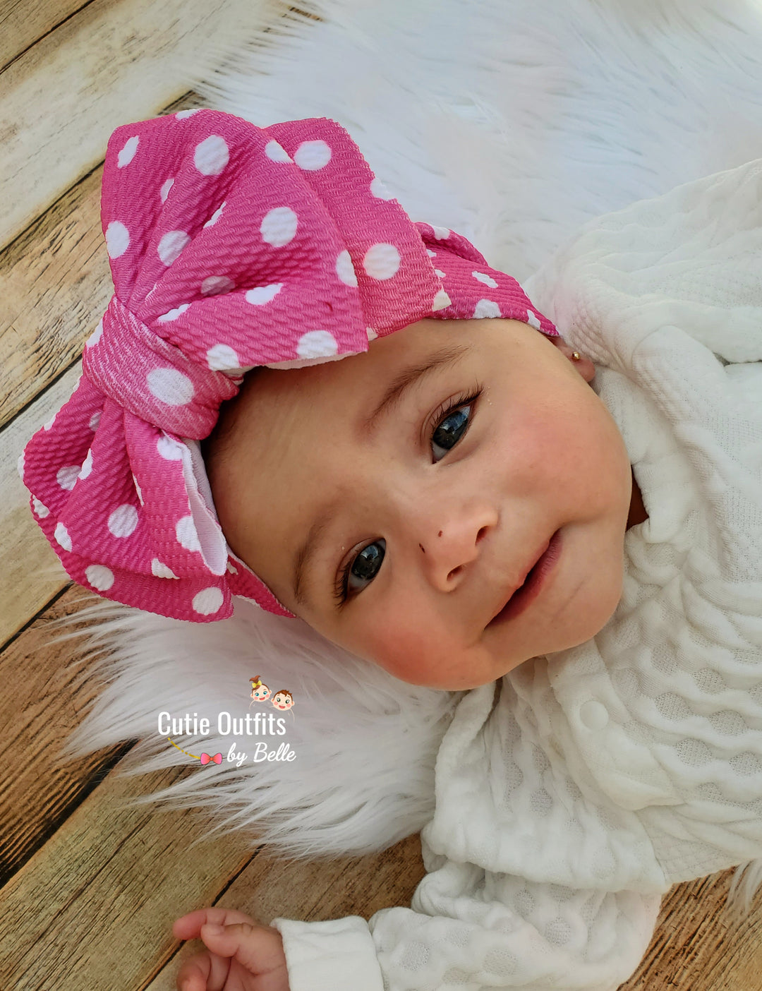 Polka dot pink baby bow